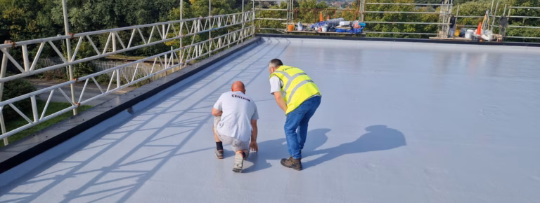 2 Centaur technicians on a project roof